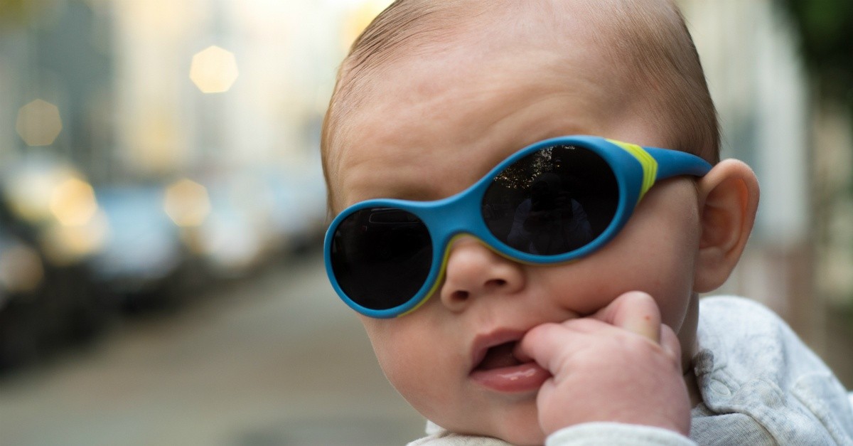 Baby wearing designer sunglasses