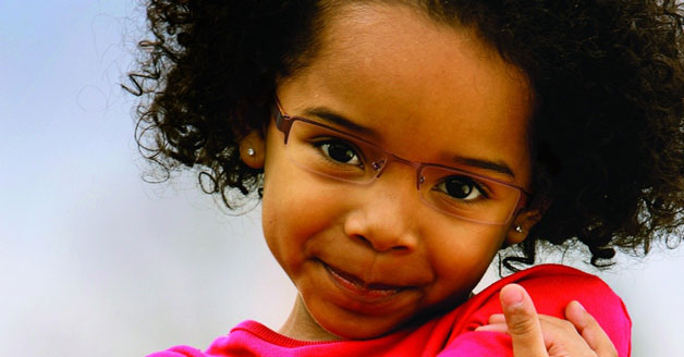 Little girl wearing glasses in pekin