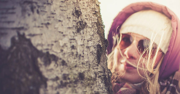 Woman wearing sunglasses in winter