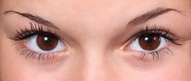 Brown eyed woman wearing contacts