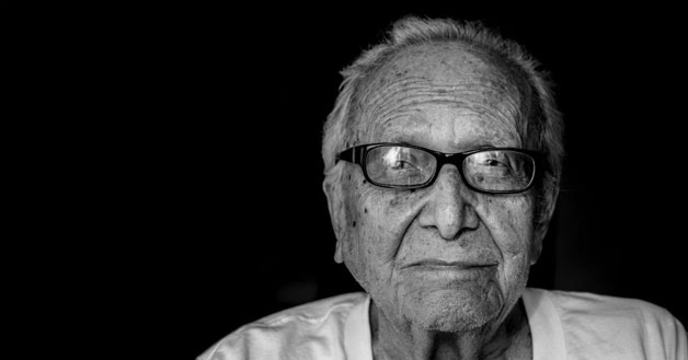 Older man with medicaid wearing eyeglasses