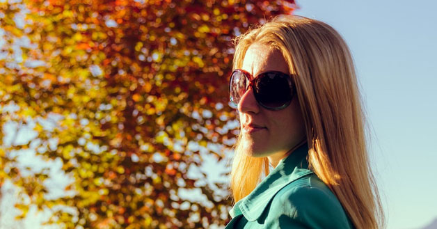 Woman wearing fashionable fall sunglasses