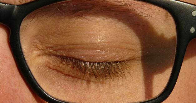 Woman closing eye lids