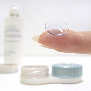 Contact lenses on a finger