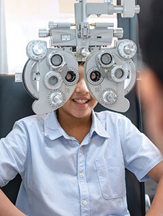 Boy getting an eye exam in Bard Optical Decatur