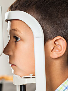 Kid getting an eye health exam at Bard Optical Springfield Wabash