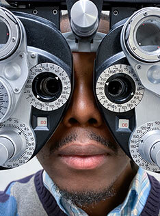 Man undergoing an eye exam in Bard Optical Washington