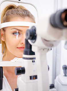 Woman getting comprehensive eye health exam in Bard Optical Washington