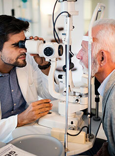 Patient getting checked for eye disease by our Bard Optical doctors in Peoria Knoxville