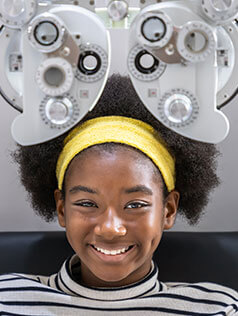 Girl smiling at Bard Optical in Peoria Knoxville