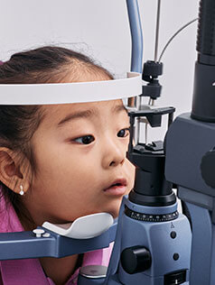 Little girl getting an eye exam