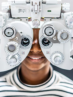 Boy getting an eye exam at Bard Optical Rock Island