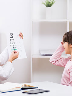 Girl getting an eye exam