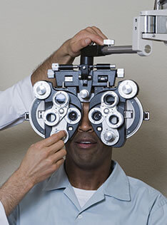Man undergoing an eye exam at Bard Optical Springfield Wabash