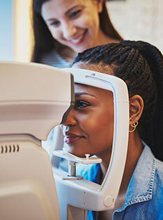 Woman having a eye exam at Bard Optical in Champaign, IL