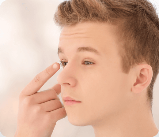 Man putting on myopia management lenses