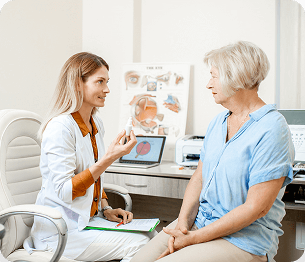 Doctor holding an eye drops educating patient