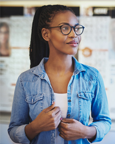 Woman wearing Bard Optical Jacksonville Eyeglasses